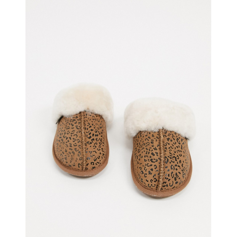 Sheepskin by Totes mule...