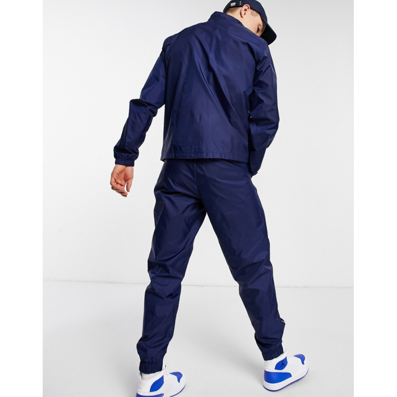 Nike woven tracksuit in navy