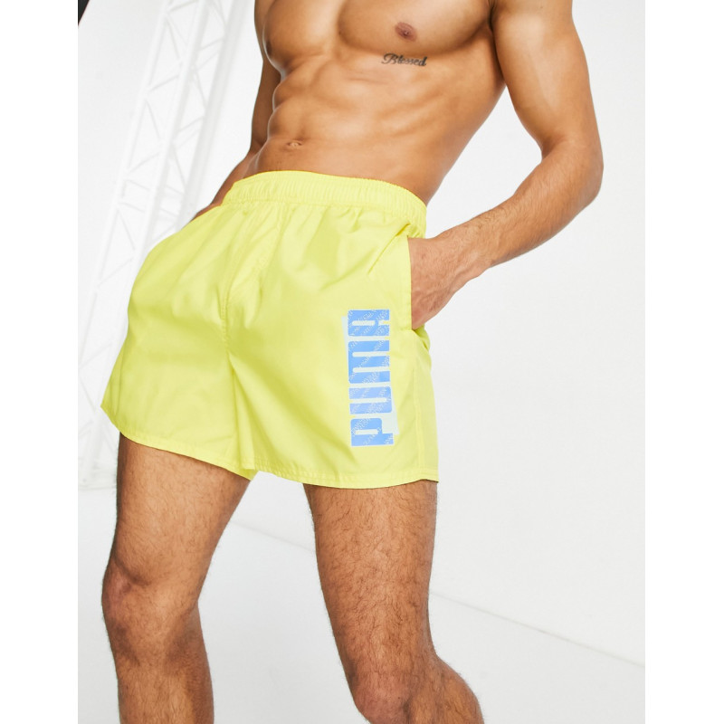 Puma ESS swim shorts in yellow
