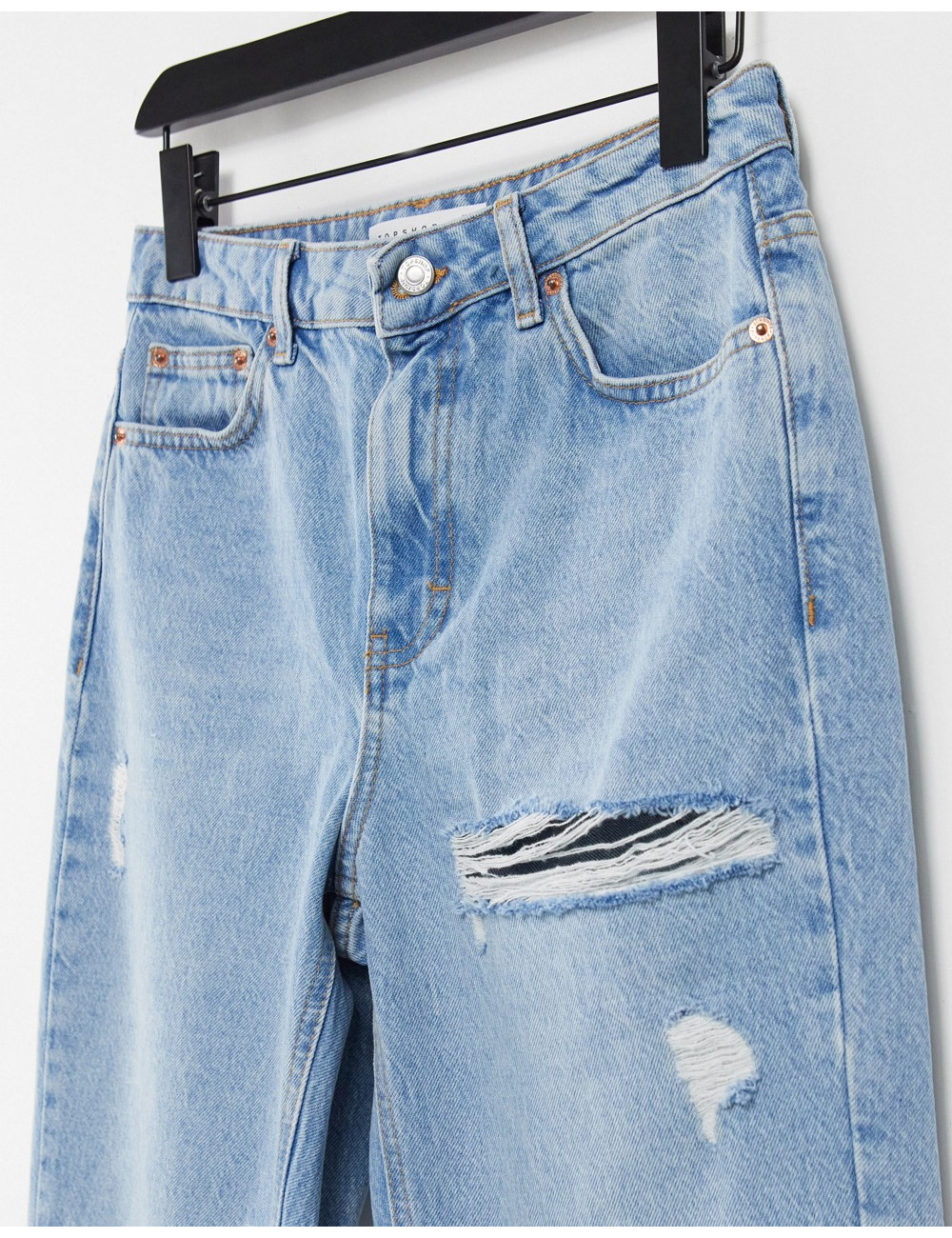 Topshop ripped mom jean in...