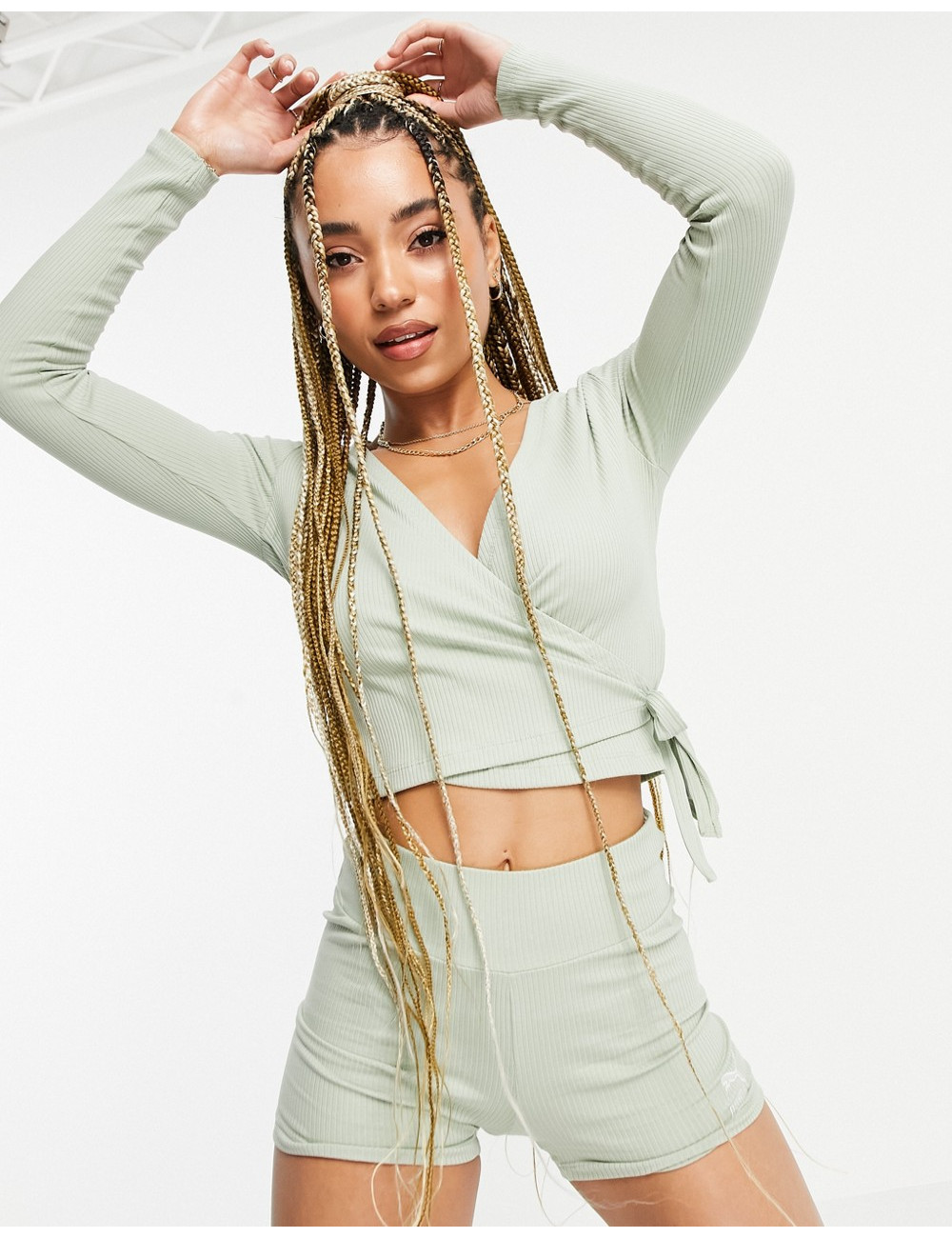 Puma ribbed wrap top in...