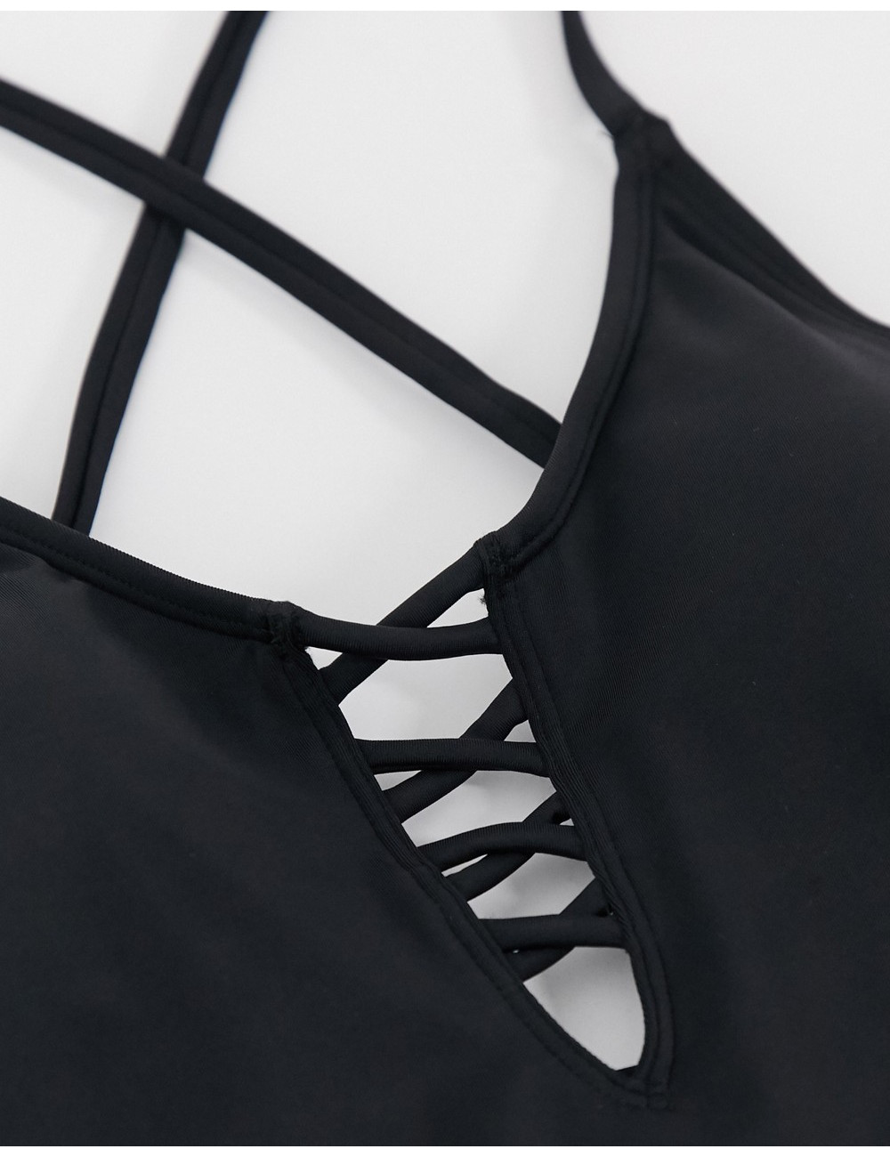 ASOS DESIGN high leg contrast strap swimsuit in black