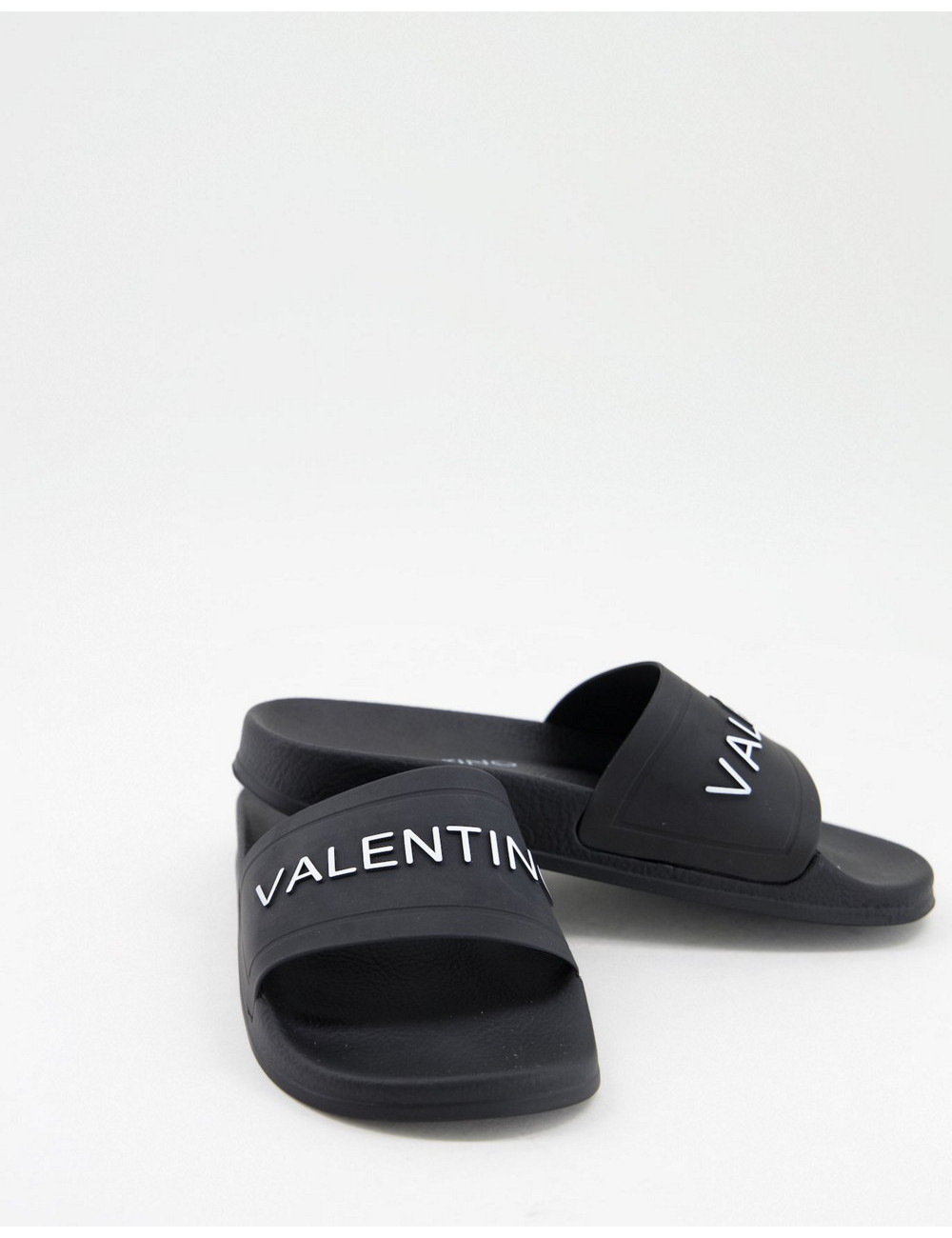 Valentino Shoes logo slides...