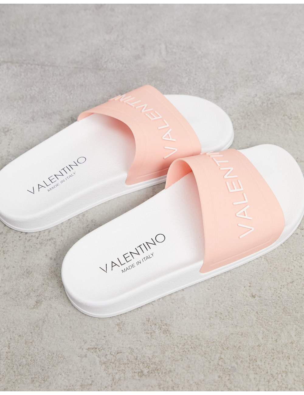 Valentino Shoes logo slides...