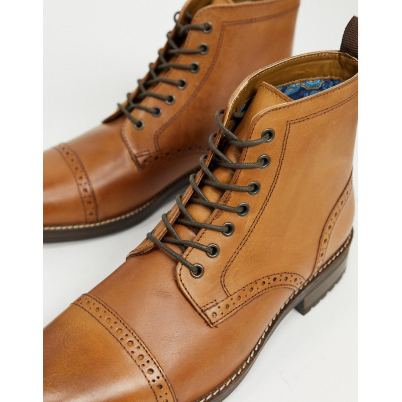 Red Tape leather brogue toe...