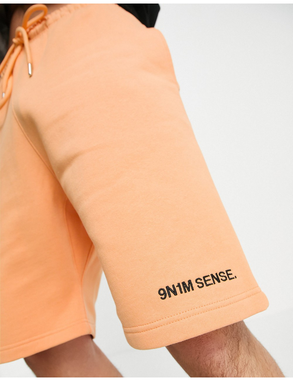 9N1M SENSE logo shorts in...