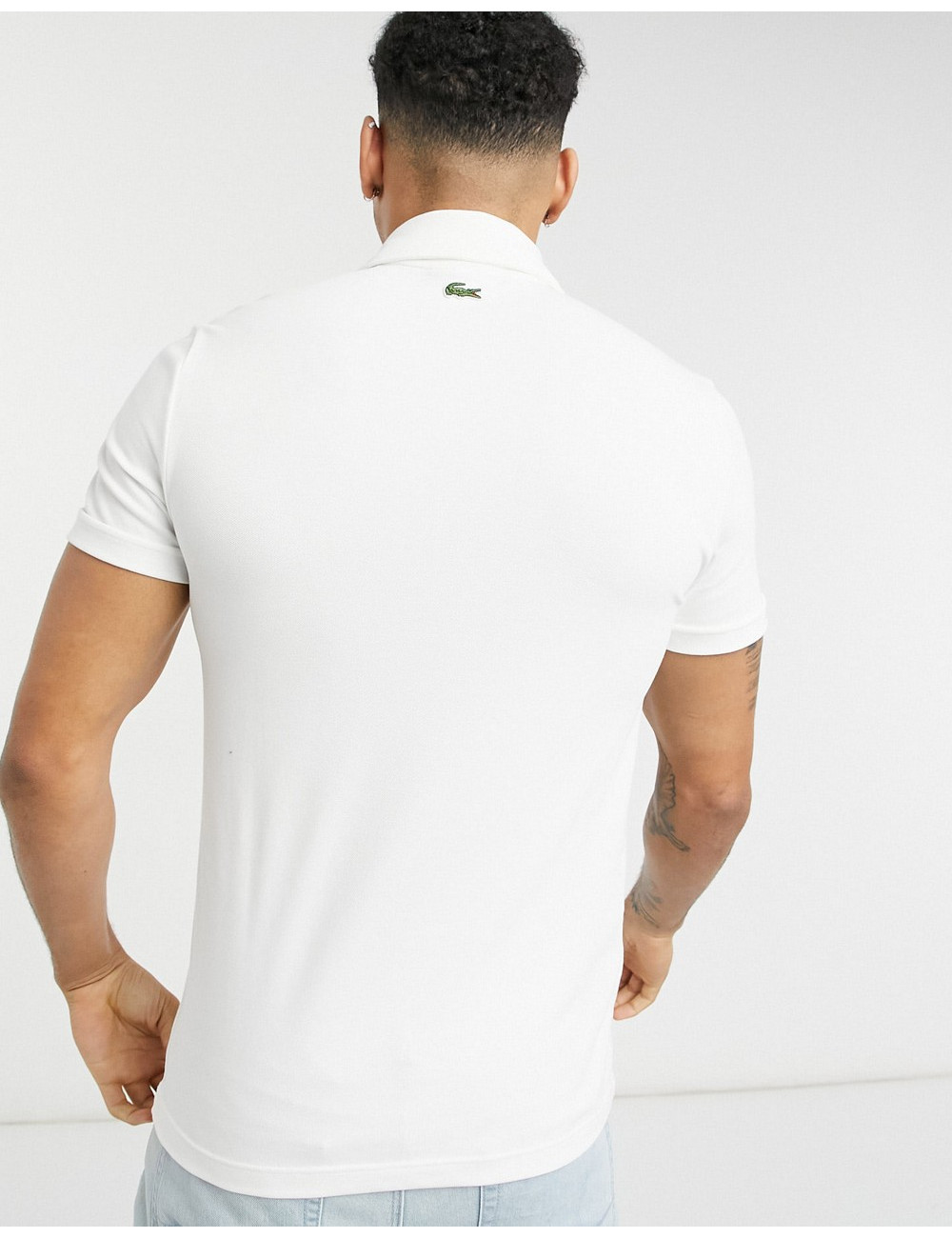 Lacoste cut and sew polo in...