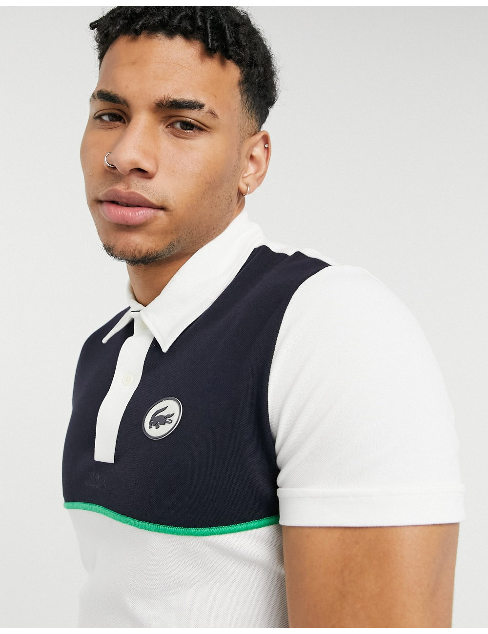 Lacoste cut and sew polo in...