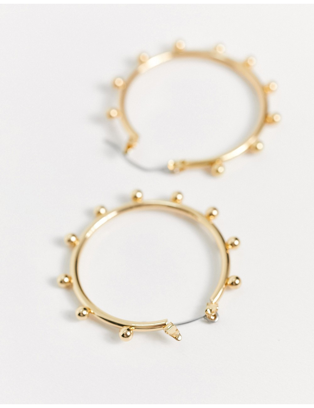 SVNX hoop designed earrings...