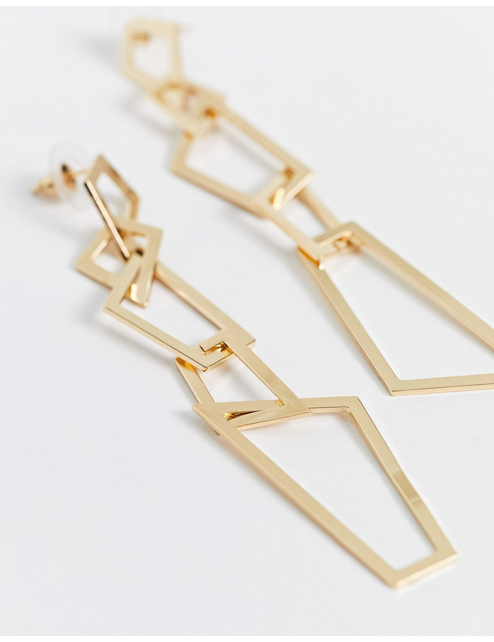 SVNX dangly earrings in gold