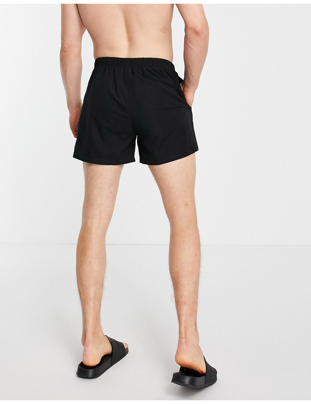 COLLUSION swim shorts in black